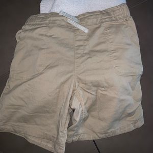Tan shorts.